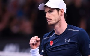 Britain's Andy Murray celebrates after winning his quarter-final tennis match against Czech Republic's Tomas Berdych at the ATP World Tour Masters 1000 indoor tournament in Paris on November 4, 2016. / AFP PHOTO / FRANCK FIFE