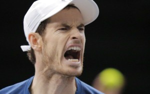 Britain's Andy Murray reacts after he breaks against John Isner of the United States during the final of the Paris Masters tennis tournament at the Bercy Arena in Paris, Sunday, Nov. 6, 2016. Murray won 6-3, 6-7, 6-4. (AP Photo/Michel Euler)