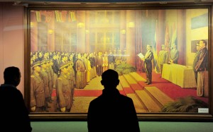 Chinese tourists view an oil painting inside the former residence of republican revolutionary Sun Yat-sen, now turned into a museum in Zhongshan, Guangdong province. Photo: AFP