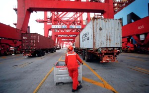 A worker at the Yangshan deep water port in the Shanghai free trade zone. Photo: Reuters