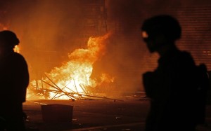 Sharp social division like during the Mong Kok riot tends to affect mental health, according to the survey. Photo: AP