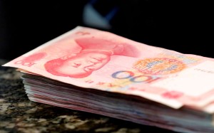 The yuan is trading below the critical level of 6.8 against the dollar. Photo: Reuters