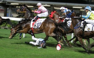 Matthew Chadwick hits the turf at Happy Valley on Wednesday night. Photos: Kenneth Chan