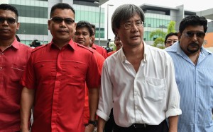 Malaysiakini's editor-in-chief Steven Gan, second from right, has been charged over a video featuring a prominent dissident. Photo: AFP