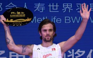 Jan O Jorgensen of Denmark celebrates on the podium after beating Chen Long to win the China Open in Fuzhou. Photo: Xinhua Jan O Jorgensen of Denmark celebrates on the podium after beating Chen Long to win the China Open in Fuzhou. Photo: Xinhua