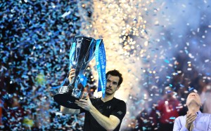Britain's Andy Murray celebrate with the trophy after winning the men's singles final against Serbia's Novak Djokovic on the eighth and final day of the ATP World Tour Finals tennis tournament in London on November 20, 2016. / AFP PHOTO / Glyn KIRK Britain's Andy Murray celebrate with the trophy after winning the men's singles final against Serbia's Novak Djokovic on the eighth and final day of the ATP World Tour Finals tennis tournament in London on November 20, 2016. / AFP PHOTO / Glyn KIRK