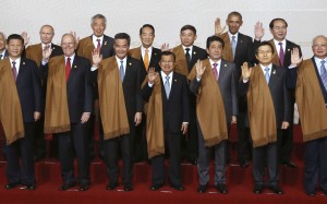 President Xi Jinping (front left) and Prime Minister Shinzo Abe (front, third from right) pictured in a group photograph of leaders attending the Apec summit in Peru. Photo: AP President Xi Jinping (front left) and Prime Minister Shinzo Abe (front, third from right) pictured in a group photograph of leaders attending the Apec summit in Peru. Photo: AP