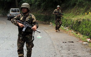 Military troops scour the site of a roadside blast in the village of Matampay in Marawi City, Southern Mindanao on November 29, 2016. Seven military bodyguards of President Rodrigo Duterte and two other soldiers were wounded on November 29 in an ambush by suspected Islamic militants on the eve of his planned visit to the southern Philippines, the military and president said. Photo: AFP Military troops scour the site of a roadside blast in the village of Matampay in Marawi City, Southern Mindanao on November 29, 2016. Seven military bodyguards of President Rodrigo Duterte and two other soldiers were wounded on November 29 in an ambush by suspected Islamic militants on the eve of his planned visit to the southern Philippines, the military and president said. Photo: AFP
