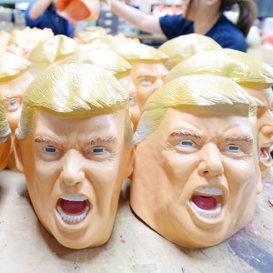 Rubber Donald Trump masks are produced at a factory in Japan. Photo: AFP