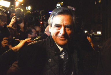 Former French prime minister Francois Fillon is surrouded by supporters at his campaign headquarters in Paris on Sunday after winning the first round of the conservative presidential primary. Photo: Xinhua Former French prime minister Francois Fillon is surrouded by supporters at his campaign headquarters in Paris on Sunday after winning the first round of the conservative presidential primary. Photo: Xinhua