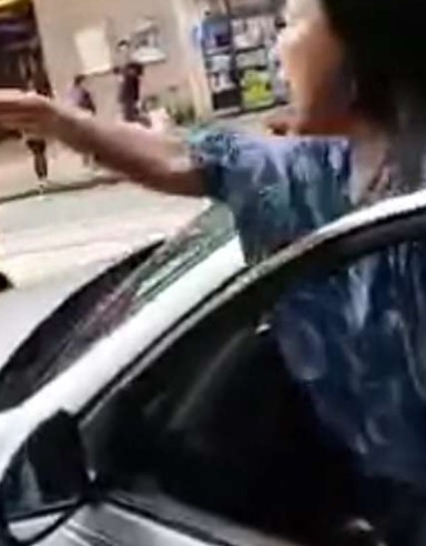 Video still of the woman abusing traffic police officer in Hong Kong. SCMP Pictures Video still of the woman abusing traffic police officer in Hong Kong. SCMP Pictures