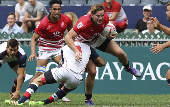 Hong Kong’s Jamie Cunningham takes on the Cayman Islands defence on the first day of the Qualifier competition at the 2016 Cathay Pacific/HSBC Hong Kong Sevens. The hosts won the game 43-0. Photo: Felix Wong/SCMP Hong Kong’s Jamie Cunningham takes on the Cayman Islands defence on the first day of the Qualifier competition at the 2016 Cathay Pacific/HSBC Hong Kong Sevens. The hosts won the game 43-0. Photo: Felix Wong/SCMP