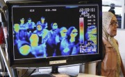 A thermal camera monitor shows the body temperature of passengers arriving from overseas against possible Mers. Photo: AP 