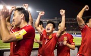The Chinese national soccer team celebrate after winning the crucial match against Qatar in Xian, Shaanxi province, on Tuesday night. Photo: Reuters