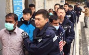 Illegal immigrants held in a joint operation. Photo: SCMP Pictures Illegal immigrants held in a joint operation. Photo: SCMP Pictures