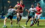 Alex McQueen stretches the Zimbabwe defence during Hong Kong’s 34-11 win at King’s Park on Tuesday night. Photo: SCMP Pictures