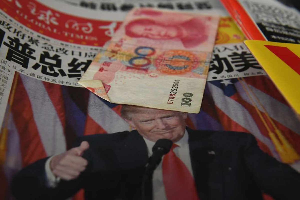 A Chinese newspaper headlined ‘President Trump shakes America’ on sale in Beijing. Photo: AFP
