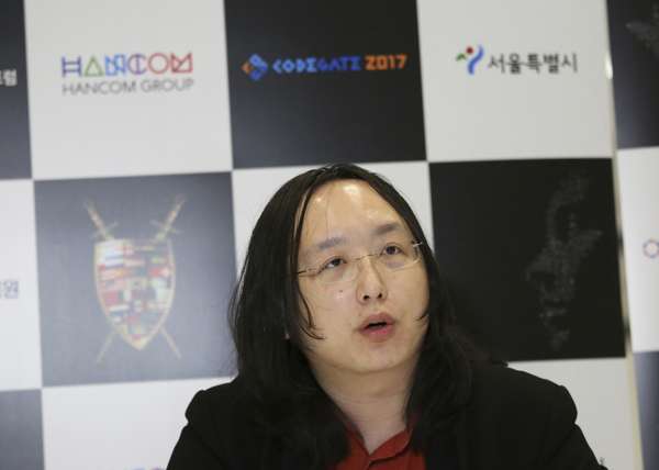 In this April 12, 2017 photo, Taiwan's digital minister Audrey Tang speaks during an interview in Seoul. Tang, a computer prodigy and entrepreneur who taught herself programming at the age of 8, hopes to use the internet to transform public involvement in government. She says she finds President Donald Trump's Twitter posts 