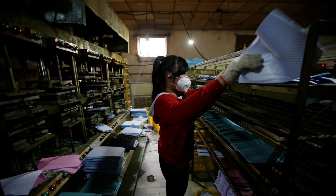 A woman works at the Tongfa shoe factory in Anxin county, part of the Xiongan New Area. Photo: Reuters