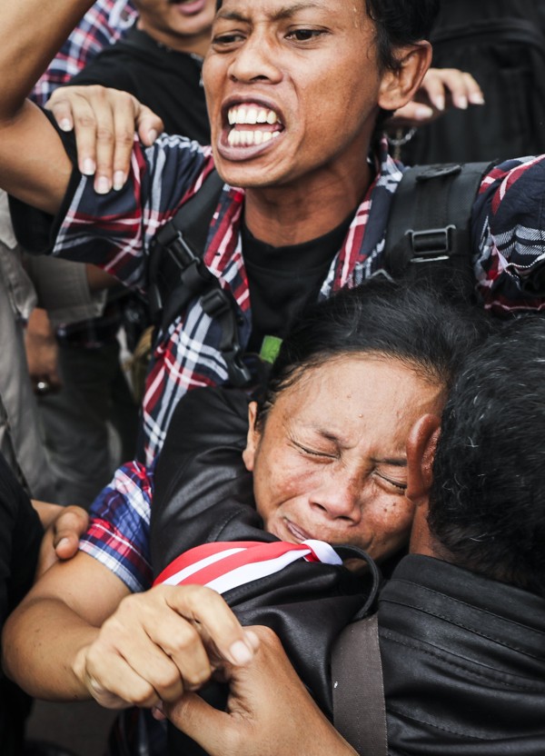 Supporters of Jakarta's Governor Basuki Tjahaja Purnama, popularly known as 'Ahok', react after the court sentenced him to two years in prison for insulting the Koran. Photo: EPA