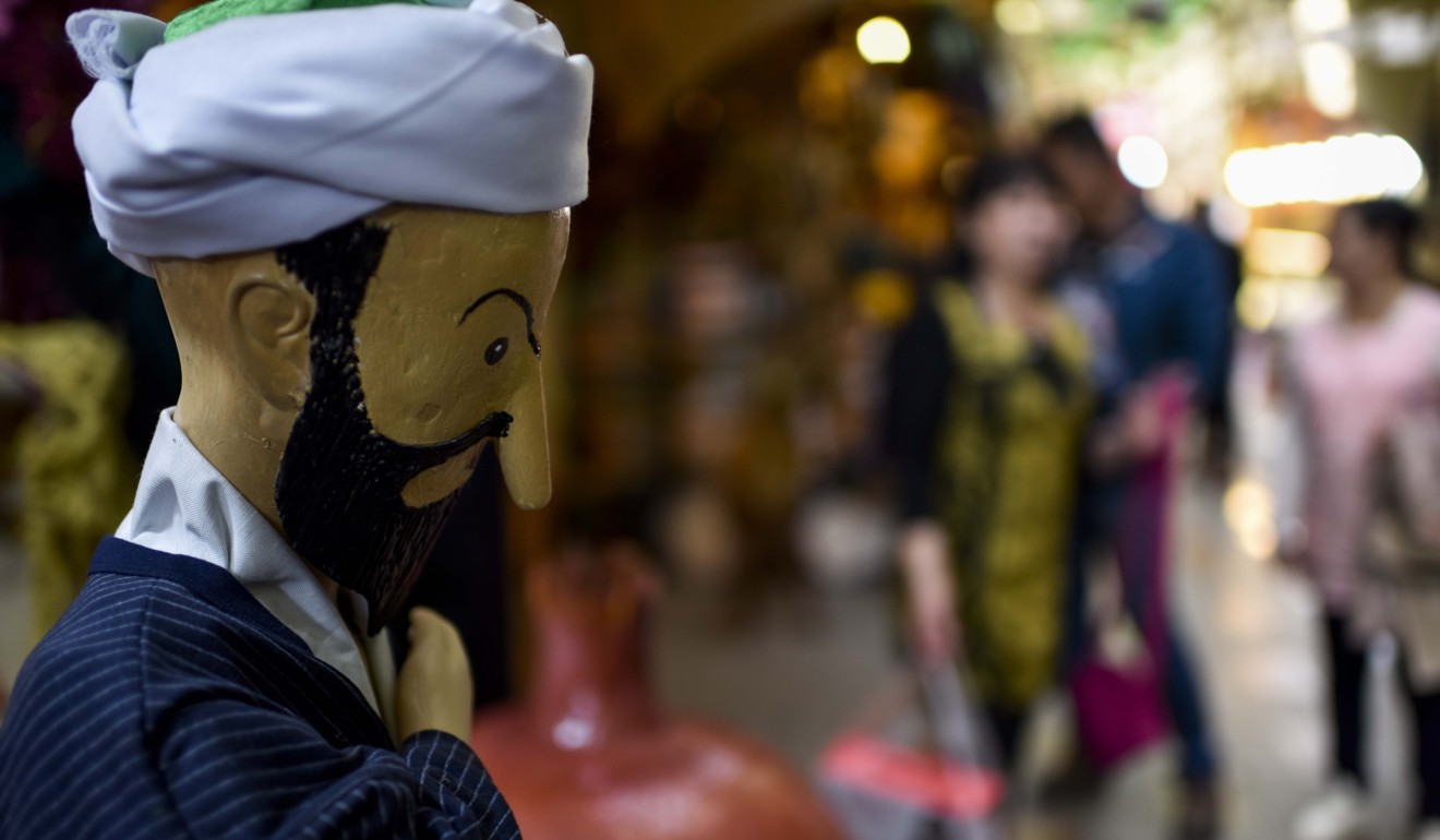 A doll on display at the Xinjiang International Grand Bazaar in Urumqi. The lack of division among the vast majority in China on issues such as dietary laws and genital mutilation is a big plus, but it also is resulting in an inability to understand why its treatment of Muslims in Xinjiang is crude and counterproductive. Photo: Xinhua