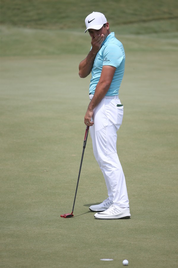 Jason Day reacts to missed birdie putt on the 4th. Photo: USA Today