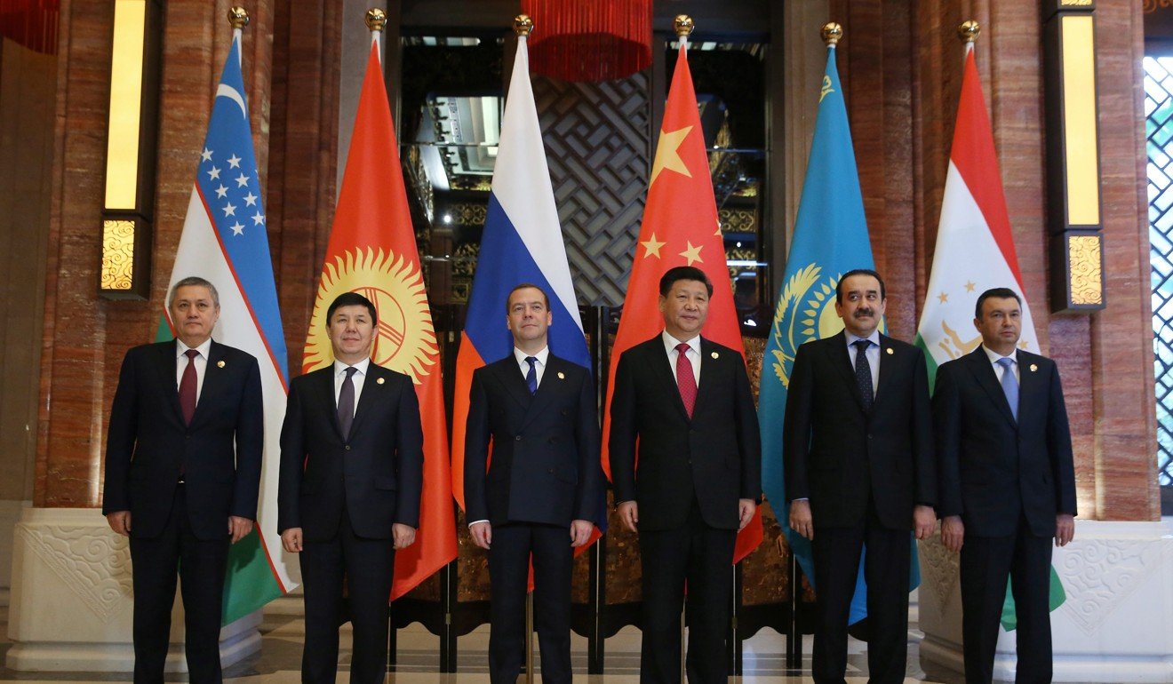 Heads of government in 2015 file photo of the Shanghai Cooperation Organisation stand with Chinese President Xi Jinping, third from the right. The other government leaders are, left to right, First Deputy Prime Minister of Uzbekistan Rustam Azimov, Prime Minister of Kyrgyzstan Temir Sariyev, Russian Prime Minister Dmitry Medvedev, Prime Minister of Kazakhstan Karim Masimov and Prime Minister of Tajikistan Kokhir Rasulzoda. Photo: EPA/Kremlin pool