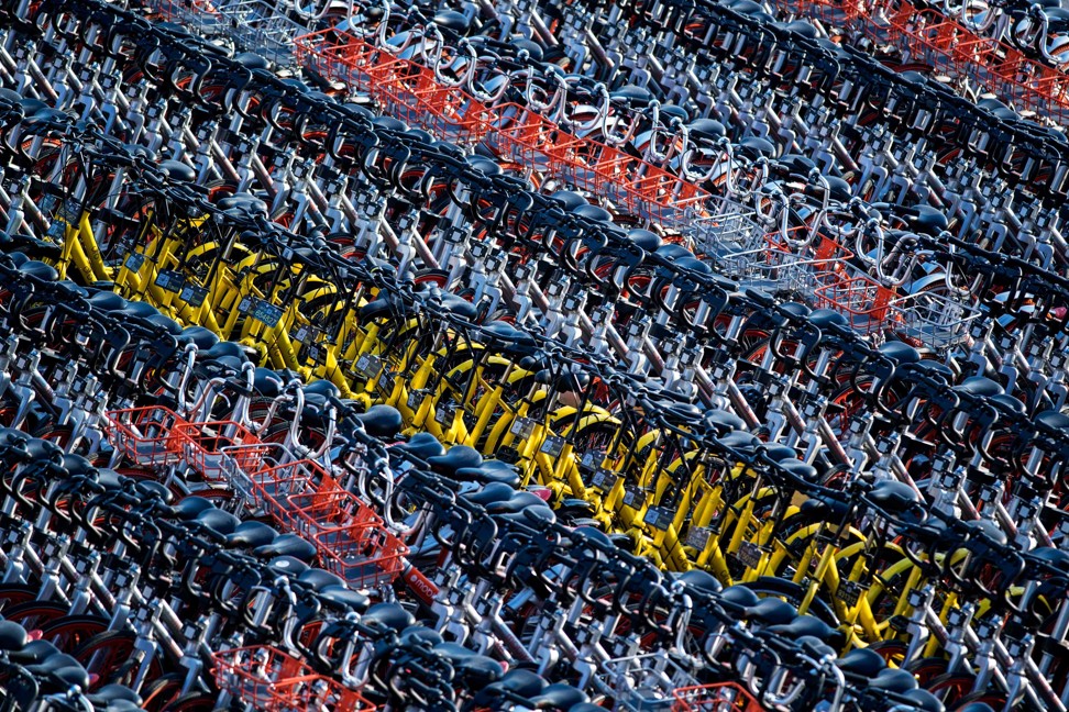 This picture taken on March 1, 2017 shows impounded bicycles from the bike-sharing schemes Mobike and Ofo in Shanghai. Shanghai has impounded thousands of brightly coloured bikes placed on city streets by cycle-sharing companies, in the latest sign of impatience with an explosion of the haphazardly-parked two-wheelers. Photo: AFP