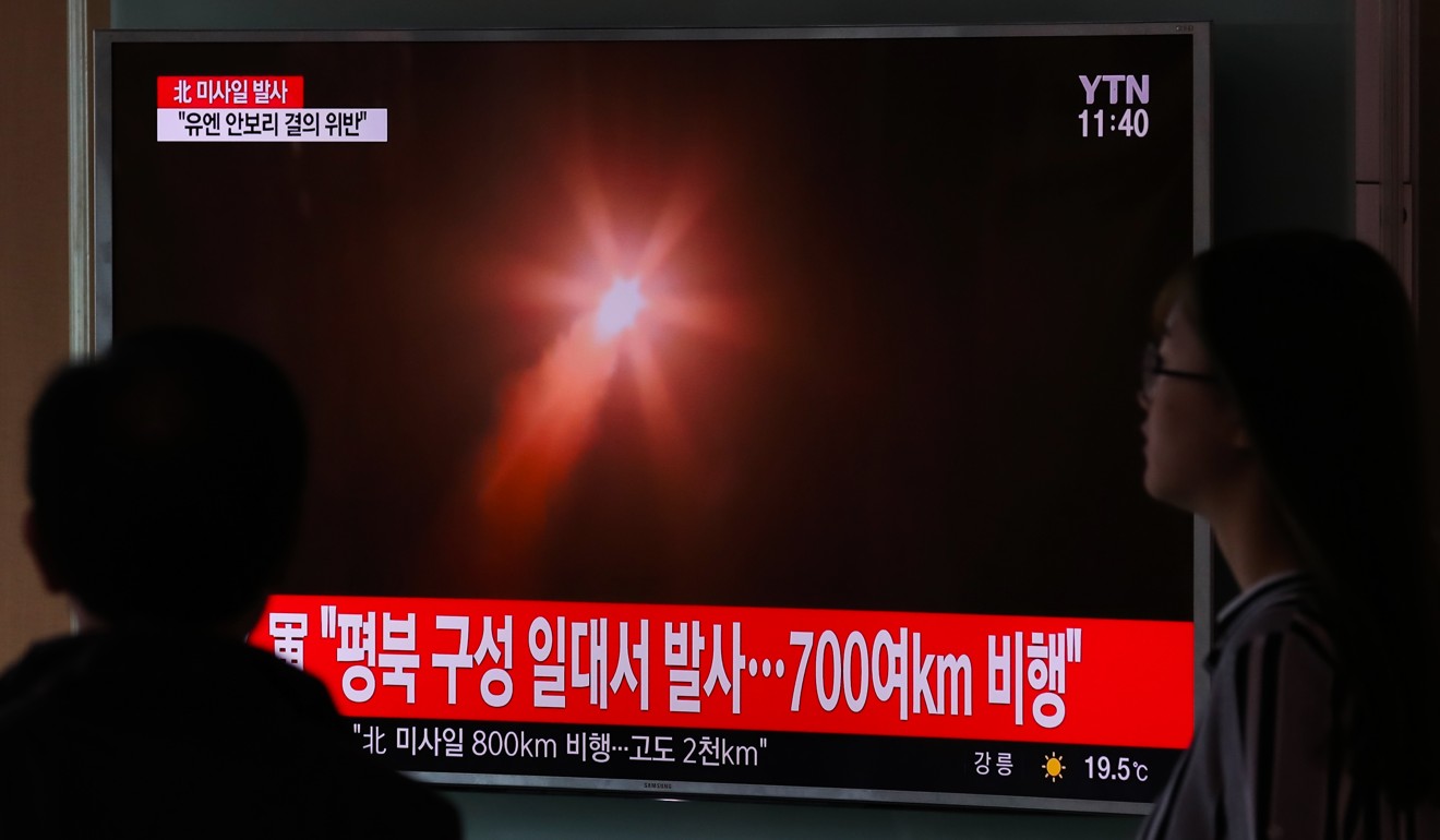 A news bulletin on a television screen at a subway station in Seoul shows footage of North Korea’s ballistic missile launch on Sunday. Photo: Bloomberg