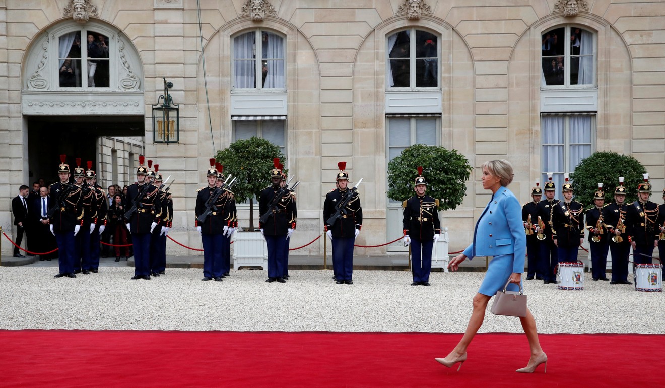 Brigitte Macron attends the handover ceremony between her husband, Emmanuel Macron, and outgoing President Francois Hollande at the Elysee Palace in Paris. Photo: Reuters