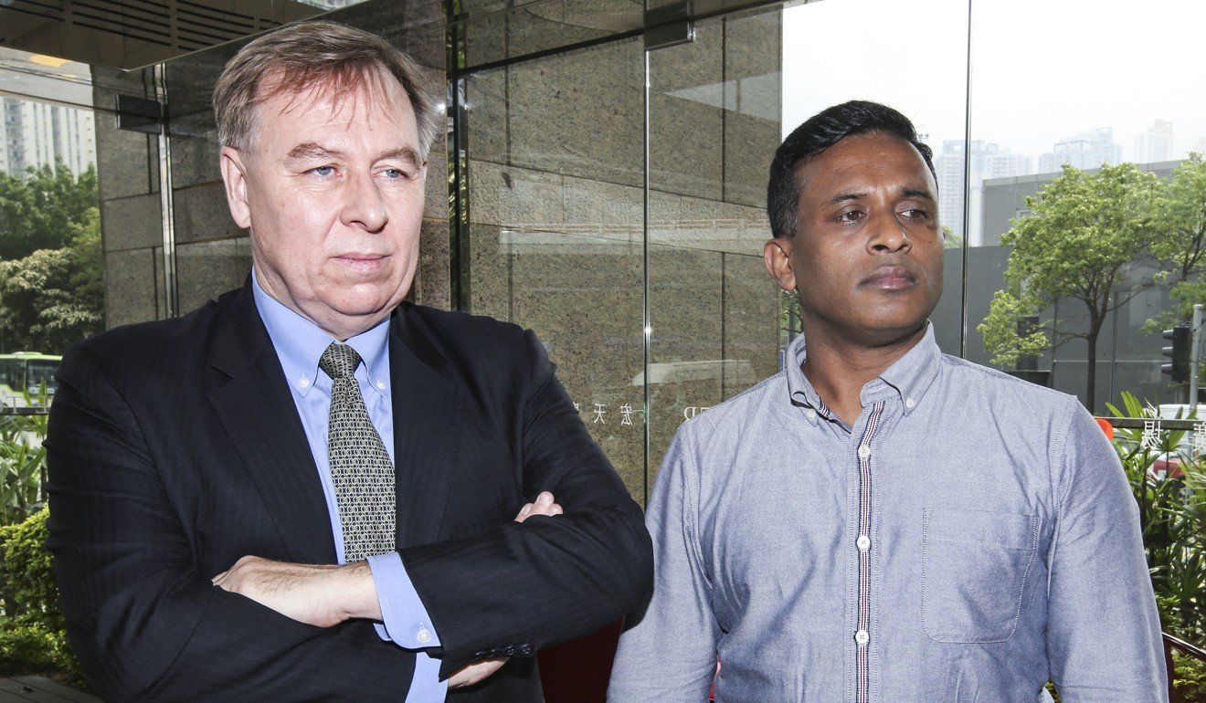 Lawyer Robert Tibbo and Ajith Pushpakumara. Photo: Edward Wong