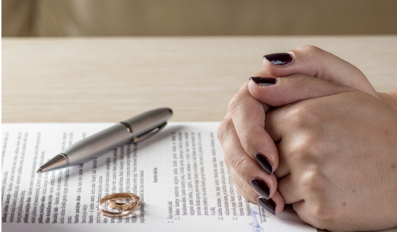 Divorce documents await at the end of a marriage.