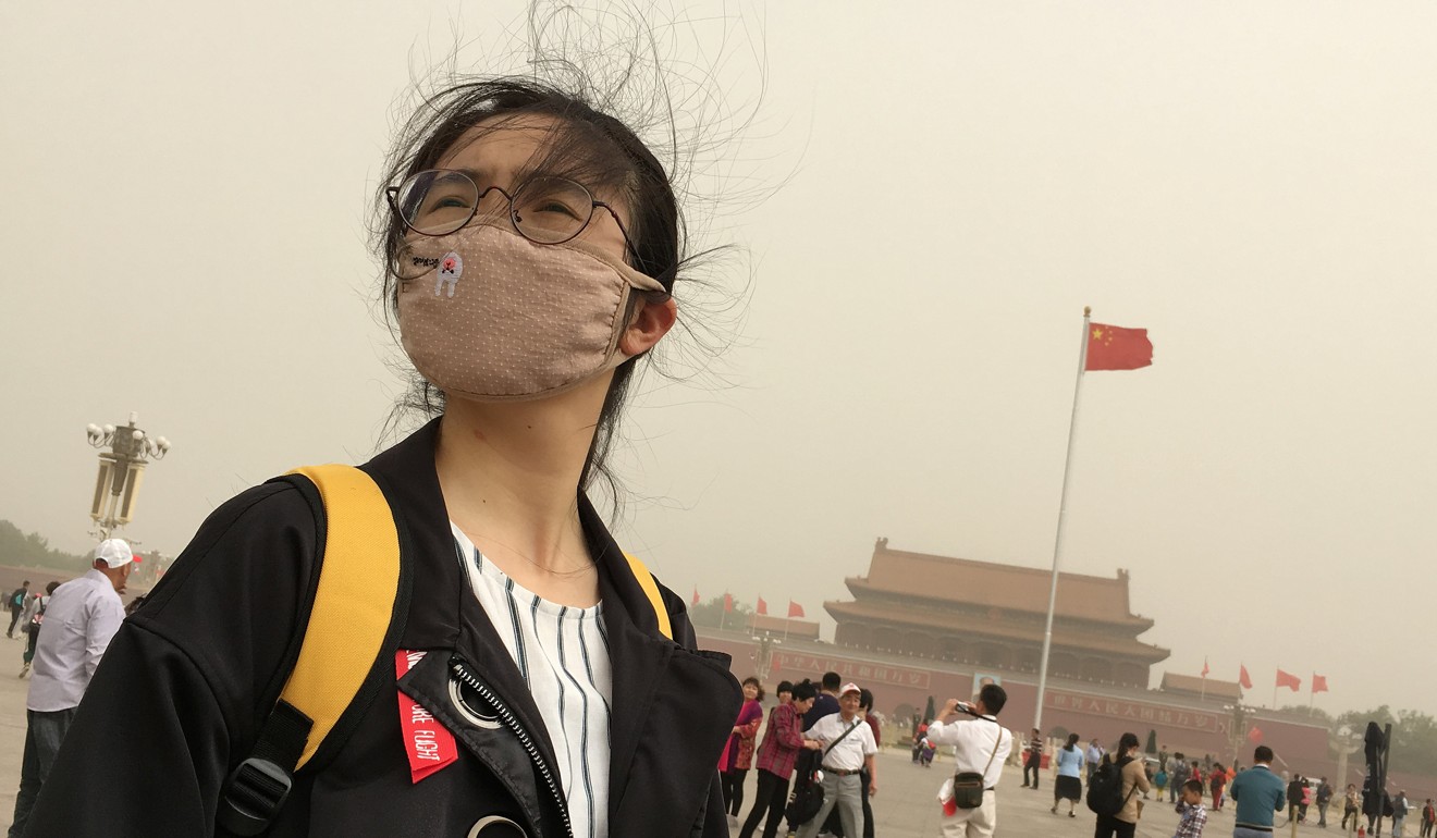 People visit Tiananmen Square as a sandstorm hits Beijing. Under Xi Jinping, China has invested heavily in renewable energy and supported extraordinary efforts to protect its people and economy from climate change and air pollution. Photo: Reuters