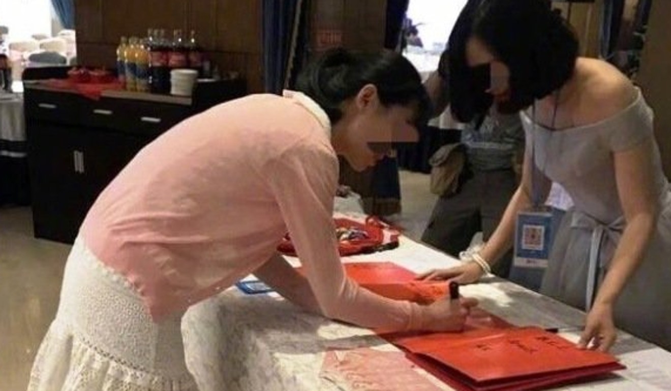 The bridesmaid with a QR code tag around her neck at a wedding ceremony in Beijing last month. Photo: Handout