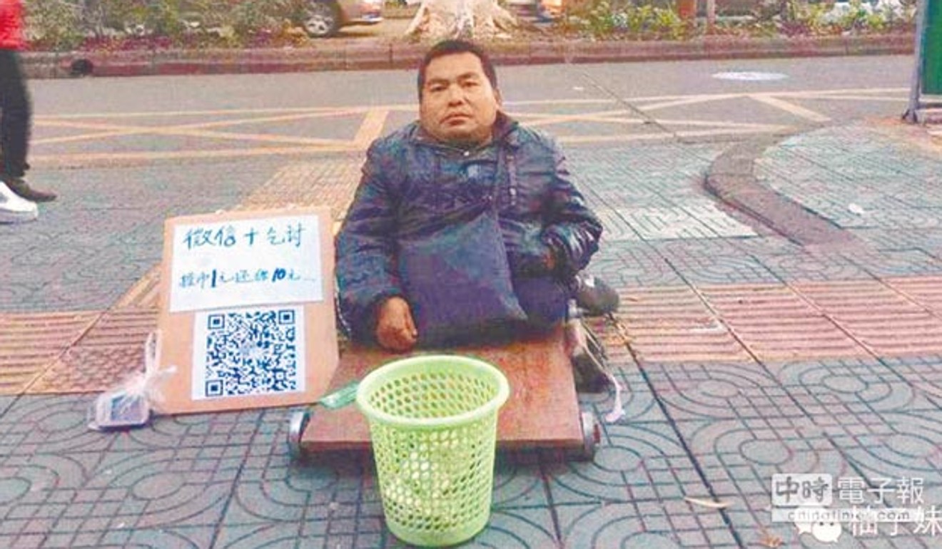 A beggar in China has come up with an innovative way to collect his handouts. Photo: Handout