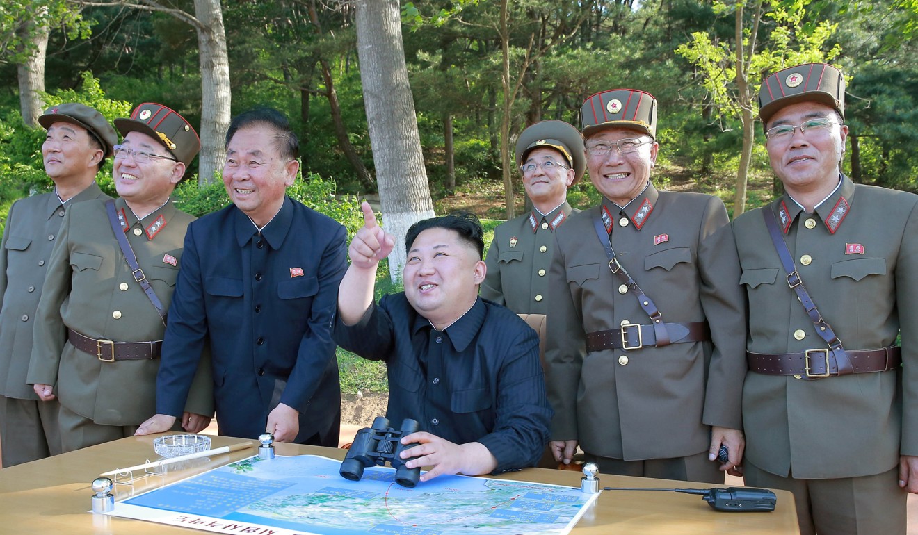 North Korean leader Kim Jong-un (centre) inspects the intermediate-range ballistic missile Pukguksong-2's launch test in a photo released on May 22. Photo: Reuters