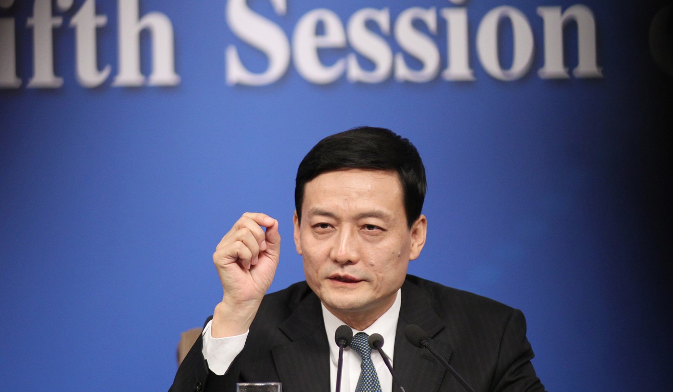Xiao Yaqing, chairman of China’s State-owned Assets Supervision and Administration Commission, speaks about the reform of state-owned enterprises at a press conference in Beijing on March 9. Photo: Simon Song