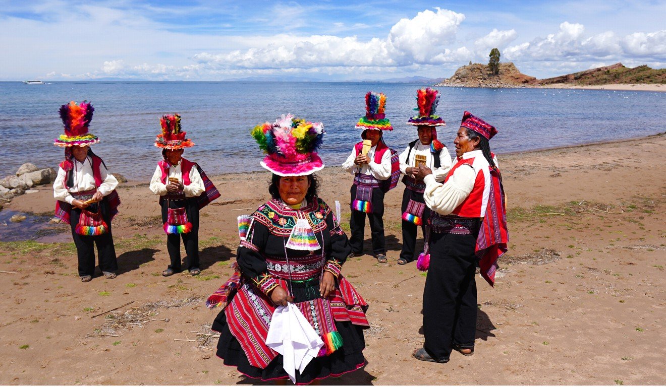 A Taquile Island welcoming committee. The inhabitants, known as Taquilenos, speak Puno Quechua and are known for their fine handwoven textiles and clothing. Photo: Marco Ruiz