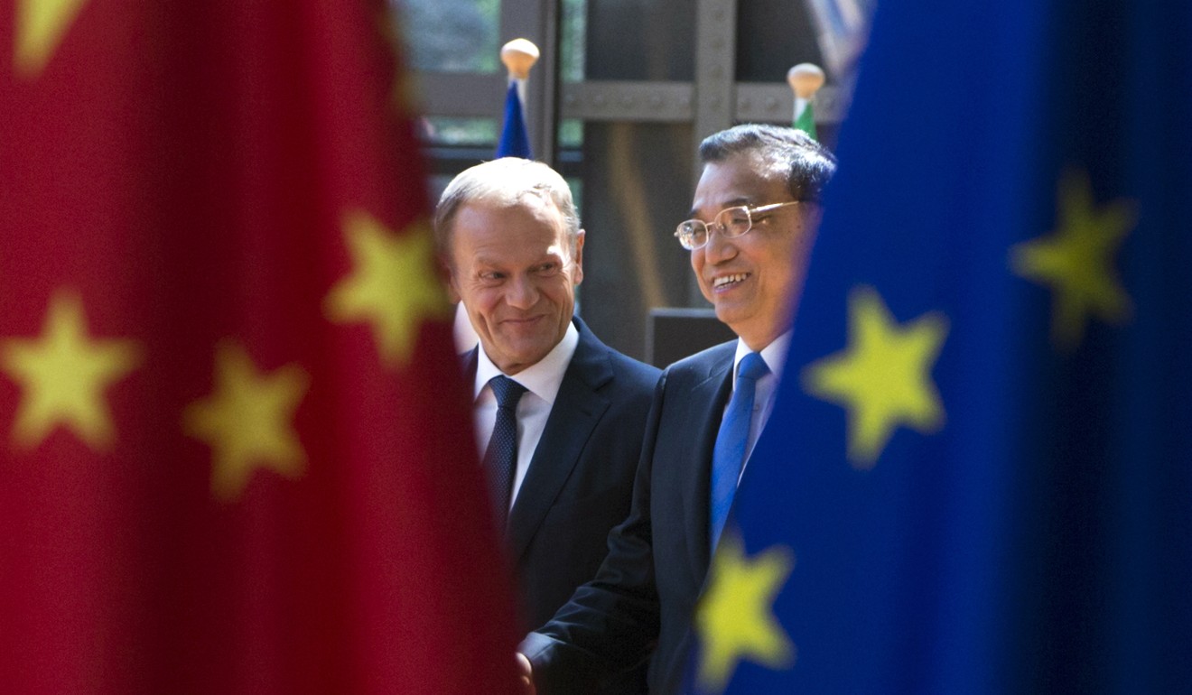 European Council President Donald Tusk and Chinese Premier Li Keqiang at an EU China summit. China and the European Union are pledging full implementation of the Paris Agreement. Photo: AFP