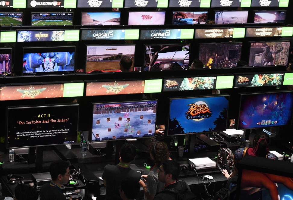 Gamers crowd the Microsoft Xbox One exhibit at the expo. Photo: AFP