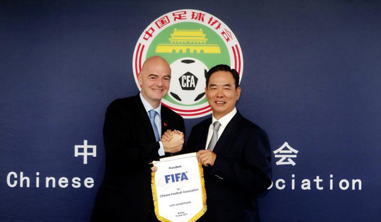 Gianni Infantino meets the Chinese Football Association's Cai Zhenhua. Photo: CFA