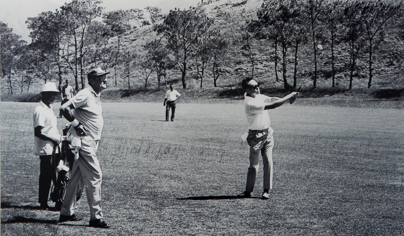 Lee Kuan Yew, right, the Singapore Prime Minister, plays golf in Hong Kong with Governor Sir David Trench. Photo: SCMP Pictures