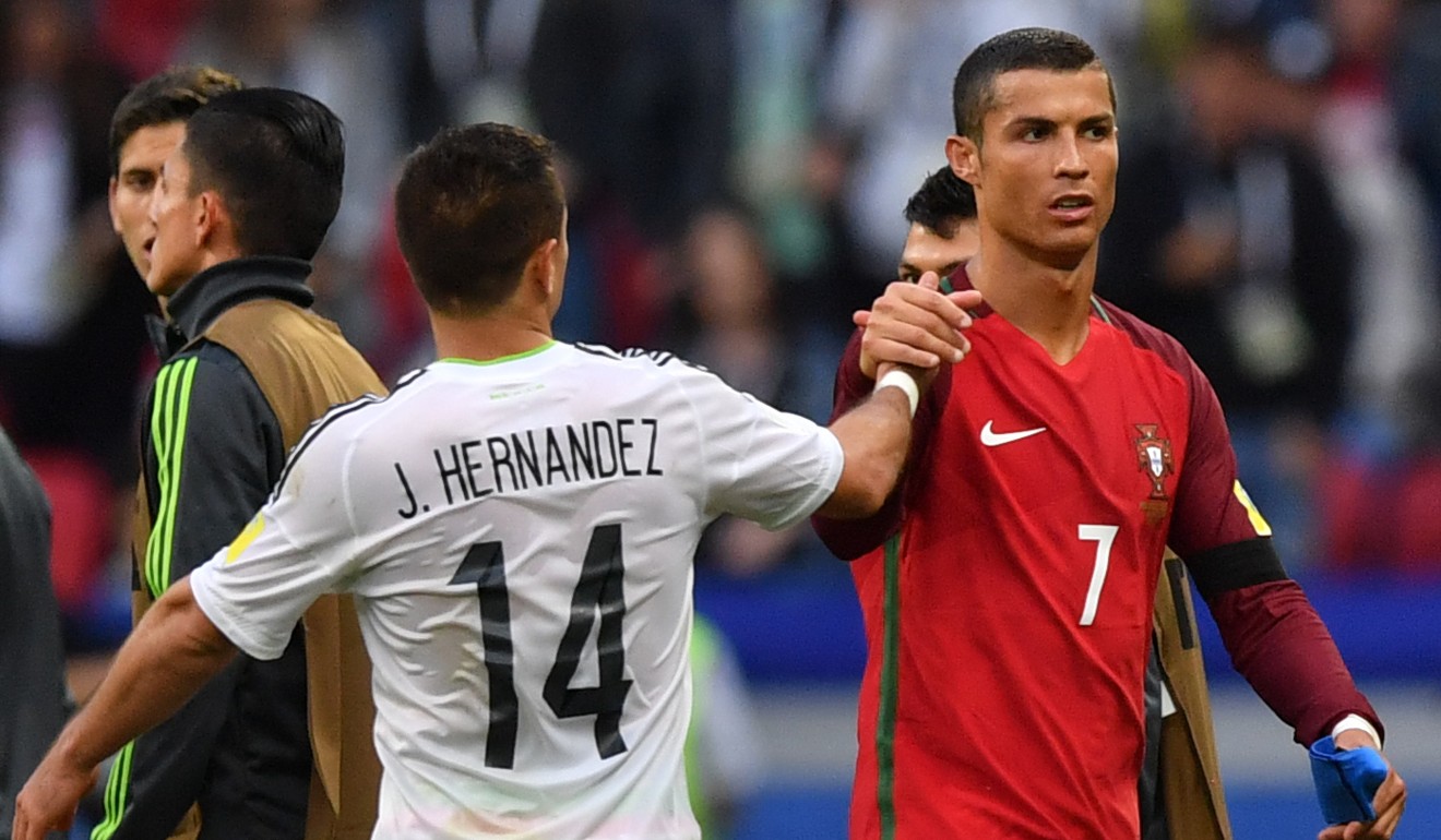 Mexico forward Javier Hernandez (left) shakes hands with Portugal’s Cristiano Ronaldo after the Confederations Cup match. Photo:” AFP