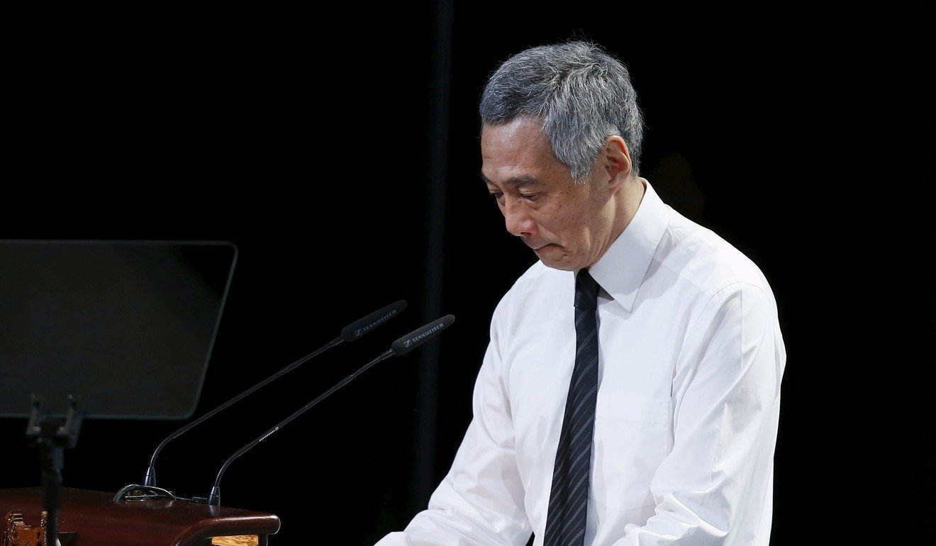 Singapore's Prime Minister Lee Hsien Loong pauses as he delivers an address at the funeral of his father, Lee Kuan Yew, at the University Cultural Centre at the National University of Singapore on March 29. Photo: Reuters