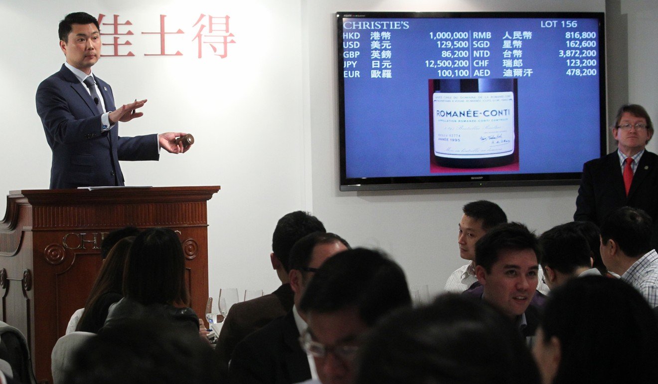 Former Chief Secretary Henry Tang ying-yen’s wine collection is auctioned by Christie’s in Central. Photo: SCMP Pictures