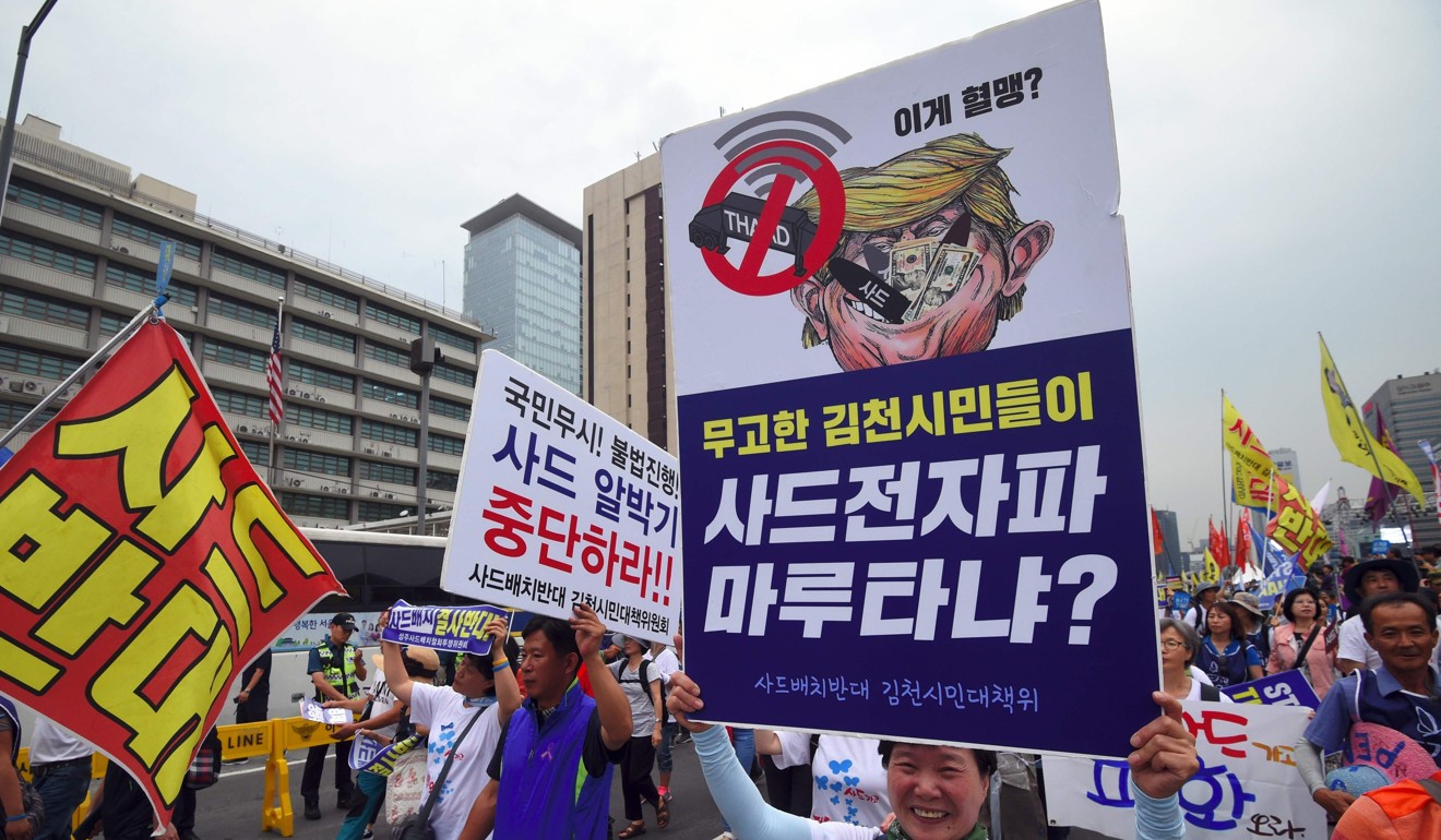 South Korean protestors surround the US embassy during a rally against the deployment of the US Terminal High Altitude Area Defence system in Seoul. Photo: AFP