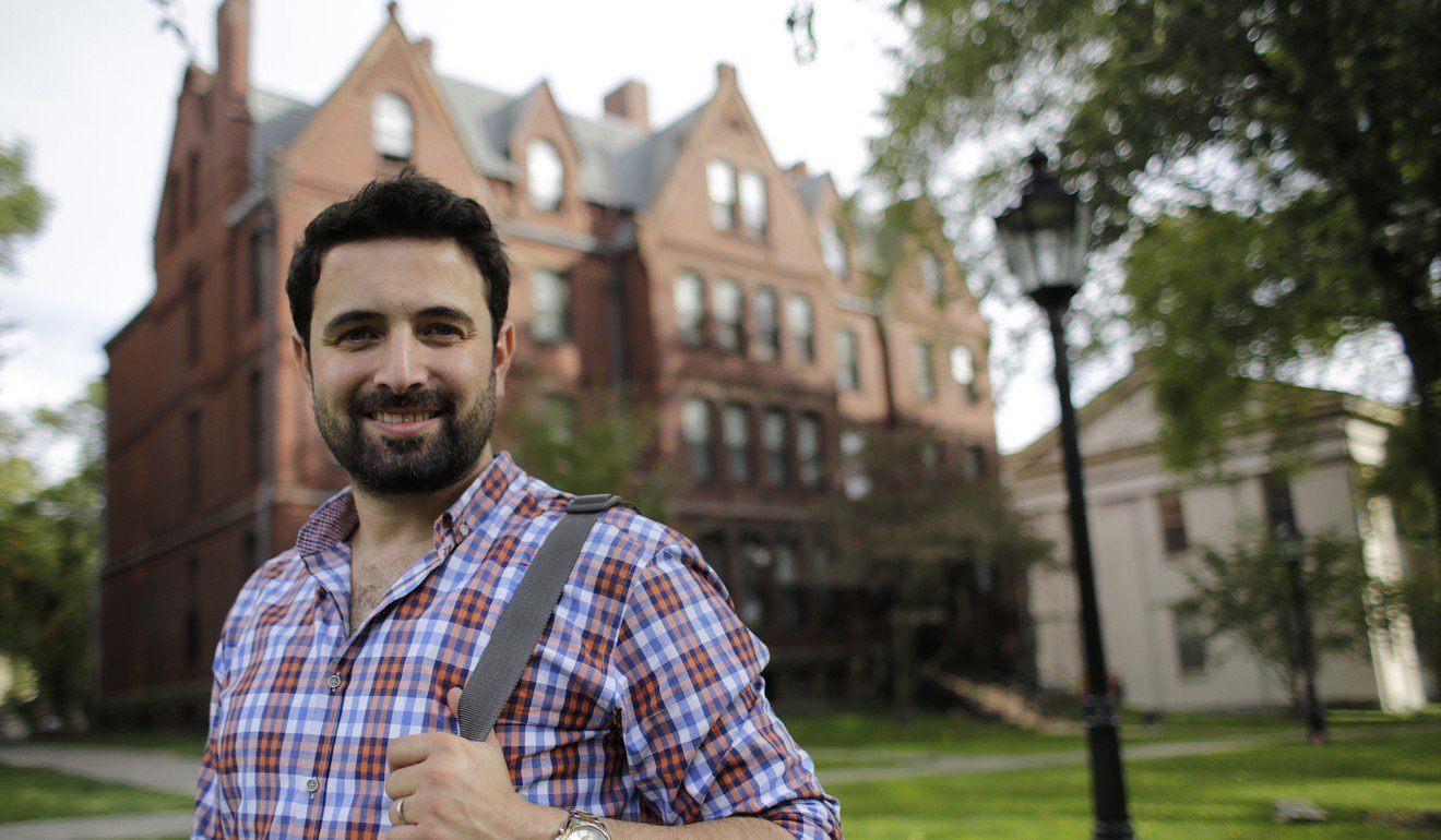 Khaled Almilaji, who coordinated a campaign that vaccinated 1.4 million Syrian children and risked his life to provide medical care during the country's civil war, stands for a portrait at Brown University in Providence, Rhode Island. Almilaji says he won't return to the United States to finish his studies at Brown because of the Trump administration's travel ban. Photo: AP