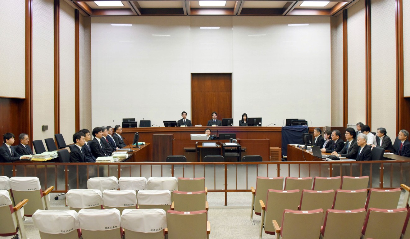 The three former Tepco bosses inside the court. Photo: Kyodo