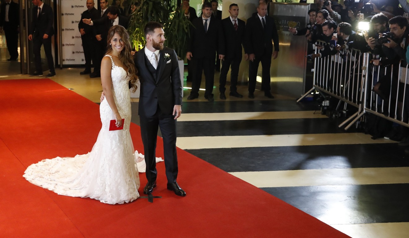 Messi and his wife Antonella Roccuzzo. Photo: EPA
