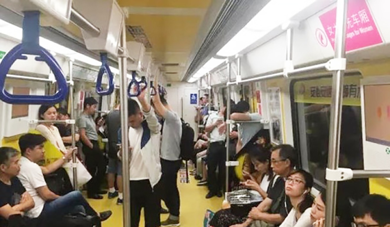 Men clearly outnumber women in this so-called “priority” carriage. Photo: Handout